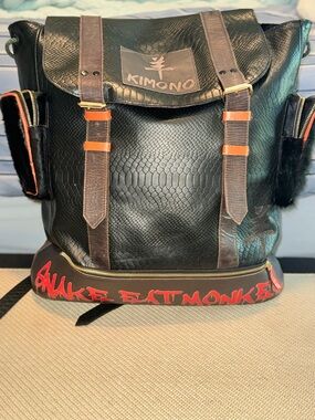 Black Snake skin Men’s Backpack with Orange Accents